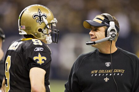 NEW ORLEANS, LA - DECEMBER 26:   Quarterback Drew Brees #9 and Head Coach Sean Payton of the New Orleans Saints talk on the sidelines during a game against the Atlanta Falcons at Mercedes-Benz Superdome on December 26, 2011 in New Orleans, Louisiana.  The Saints defeated the Falcons 45-16.  <br /><br /><span class="help">(Photo by Wesley Hitt/Getty Images)</span>