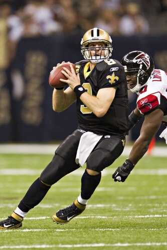 NEW ORLEANS, LA - DECEMBER 26:   Quarterback Drew Brees #9 of the New Orleans Saints drops back to pass against the Atlanta Falcons at Mercedes-Benz Superdome on December 26, 2011 in New Orleans, Louisiana.  The Saints defeated the Falcons 45-16.  <br /><br /><span class="help">(Photo by Wesley Hitt/Getty Images)</span>
