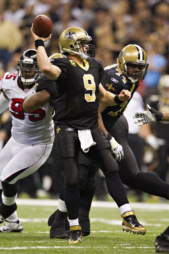 NEW ORLEANS, LA - DECEMBER 26:  Quarterback Drew Brees #9 of the New Orleans Saints throws a pass against the Atlanta Falcons at Mercedes-Benz Superdome on December 26, 2011 in New Orleans, Louisiana.  The Saints defeated the Falcons 45-16.  <br /><br /><span class="help">(Photo by Wesley Hitt/Getty Images)</span>