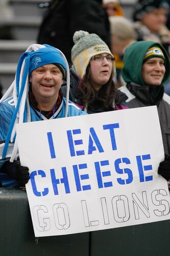 GREEN BAY, WI - JANUARY 1: A Lions fan holds up a sign as he watches pre game warm ups prior to the game between the Green Bay Packers against the Detroit Lions at Lambeau Field on January 1, 2012 in Green Bay, Wisconsin. <br /><br /><span class="help">(Photo by Scott Boehm/Getty Images)</span>