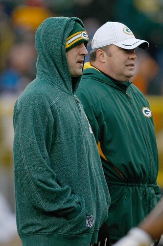 GREEN BAY, WI - JANUARY 1: Aaron Rogers #12 of the Green Bay Packers talks with Mike McCarthy as they watch pre game warm ups prior to the game against the Detroit Lions at Lambeau Field on January 1, 2012 in Green Bay, Wisconsin. <br /><br /><span class="help">(Photo by Scott Boehm/Getty Images)</span>