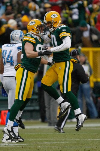 GREEN BAY, WI - JANUARY 1: Matt Flynn #10 of the Green Bay Packers celebrates a touchdown with Ryan Taylor #82 during the game against the Detroit Lions at Lambeau Field on January 1, 2012 in Green Bay, Wisconsin. <br /><br /><span class="help">(Photo by Scott Boehm/Getty Images)</span>