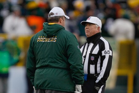 GREEN BAY, WI - JANUARY 1: Mike McCarthy of the Green Bay Packers talks with Walt Coleman during the game against the Detroit Lions at Lambeau Field on January 1, 2012 in Green Bay, Wisconsin. <br /><br /><span class="help">(Photo by Scott Boehm/Getty Images)</span>