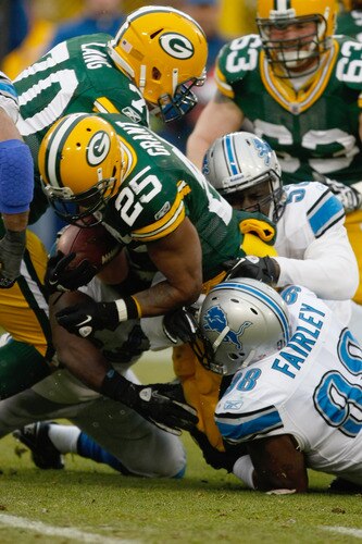 GREEN BAY, WI - JANUARY 1: Ryan Grant #25 of the Green Bay Packers runs during the game against the Detroit Lions at Lambeau Field on January 1, 2012 in Green Bay, Wisconsin. <br /><br /><span class="help">(Photo by Scott Boehm/Getty Images)</span>