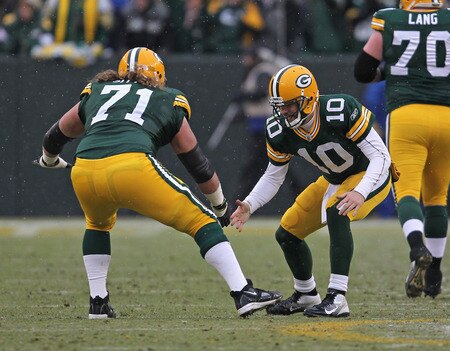 GREEN BAY, WI - JANUARY 01: Matt Flynn #10 of the Green Bay Packers celebrates a touchdown pass with Josh Sitton #71 against the Detroit Lions at Lambeau Field on January 1, 2012 in Green Bay, Wisconsin. The Packers defeated the Lions 45-41.<br /><br /><span class="help">(Photo by Jonathan Daniel/Getty Images)</span>