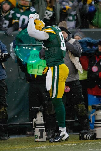 GREEN BAY, WI - JANUARY 1: Jermichael Finley #88 of the Green Bay Packers celebrates in the end zone after scoring a touchdown during the game against the Detroit Lions at Lambeau Field on January 1, 2012 in Green Bay, Wisconsin. The Packers defeated the Lions 45-41. <br /><br /><span class="help">(Photo by Scott Boehm/Getty Images)</span>