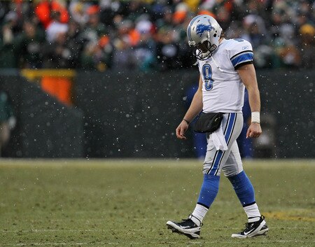 GREEN BAY, WI - JANUARY 01: Matthew Stafford #9 of the Detroit Lions walks off of the field after throwing an interception to the Green Bay Packers with 30 seconds on the clock at Lambeau Field on January 1, 2012 in Green Bay, Wisconsin. The Packers defeated the Lions 45-41.  <br /><br /><span class="help">(Photo by Jonathan Daniel/Getty Images)</span>