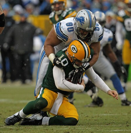 GREEN BAY, WI - JANUARY 01:  Ndamukong Suh #90 of the Detroit Lions sacks Matt Flynn #10 of the Green Bay Packers at Lambeau Field on January 1, 2012 in Green Bay, Wisconsin. The Packers defeated the Lions 45-41.  <br /><br /><span class="help">(Photo by Jonathan Daniel/Getty Images)</span>