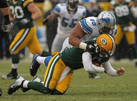 GREEN BAY, WI - JANUARY 01:  Ndamukong Suh #90 of the Detroit Lions sacks Matt Flynn #10 of the Green Bay Packers at Lambeau Field on January 1, 2012 in Green Bay, Wisconsin. The Packers defeated the Lions 45-41.  <br /><br /><span class="help">(Photo by Jonathan Daniel/Getty Images)</span>