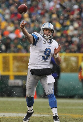 GREEN BAY, WI - JANUARY 01:  Matthew Stafford #9 of the Detroit Lions throws a pass against the Green Bay Packers at Lambeau Field on January 1, 2012 in Green Bay, Wisconsin. The Packers defeated the Lions 45-41.  <br /><br /><span class="help">(Photo by Jonathan Daniel/Getty Images)</span>