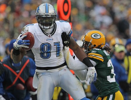 GREEN BAY, WI - JANUARY 01: Calvin Johnson #81 of the Detroit Lions breaks away from Tramon Williams #38 of the Green Bay Packers after catching a pass at Lambeau Field on January 1, 2012 in Green Bay, Wisconsin. The Packers defeated the Lions 45-41. <br /><br /><span class="help">(Photo by Jonathan Daniel/Getty Images)</span>