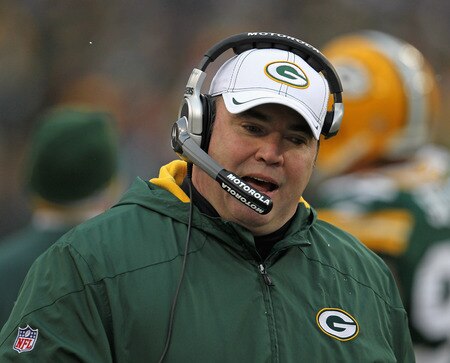 GREEN BAY, WI - JANUARY 01: Head coach Mike McCarthy of the Green Bay Packers talks to a coach in his headset during a game against the Detroit Lions at Lambeau Field on January 1, 2012 in Green Bay, Wisconsin. The Packers defeatedc the Lions 45-41.<br /><br /><span class="help">(Photo by Jonathan Daniel/Getty Images)</span>