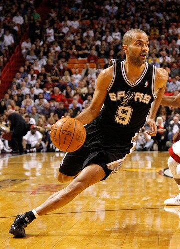 MIAMI, FL - JANUARY 17:  Tony Parker #9 of the San Antonio Spurs drives to the basket during a game against the Miami Heat at American Airlines Arena on January 17, 2012 in Miami, Florida. <br /><br /><span class="help">(Photo by Mike Ehrmann/Getty Images)</span>