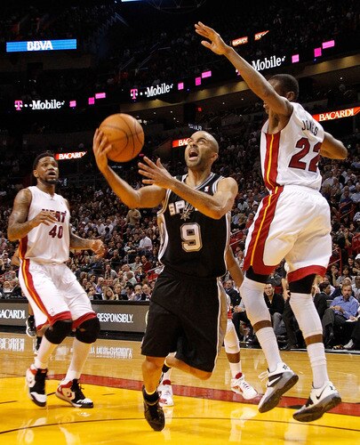 MIAMI, FL - JANUARY 17:  Tony Parker #9 of the San Antonio Spurs drives to the basket during a game against the Miami Heat at American Airlines Arena on January 17, 2012 in Miami, Florida. <br /><br /><span class="help">(Photo by Mike Ehrmann/Getty Images)</span>