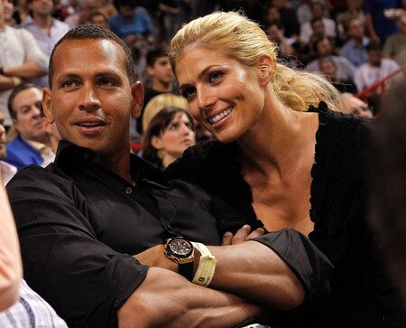 MIAMI, FL - JANUARY 17: Baseball player Alex Rodriguez (L) of the New York Yankees and Torrie Wilson watch a game between the Miami Heat and the San Antonio Spurs at American Airlines Arena on January 17, 2012 in Miami, Florida. <br /><br /><span class="help">(Photo by Mike Ehrmann/Getty Images)</span>