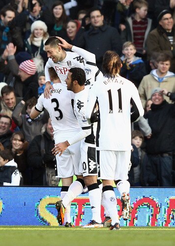 LONDON, ENGLAND - FEBRUARY 11:  Clint Dempsey of Fulham (C) celebrates celebrates with team-mates after their goal during the Barclays Premier League match between Fulham and Stoke City at Craven Cottage on February 11, 2012 in London, England.  <br /><br /><span class="help">(Photo by Ian Walton/Getty Images)</span>