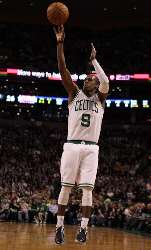 BOSTON, MA - FEBRUARY 15:  Rajon Rondo #9 of the Boston Celtics takes a shot in the first quarter against the Detroit Pistons on February 15, 2012 at TD Garden in Boston, Massachusetts. <br />
<br />
(Photo by Elsa/Getty Images)