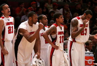NEW YORK - MARCH 14:  The Louisville Cardinals bench reacts late in the game against the Syracuse Orange during the championship game of the Big East Tournament at Madison Square Garden on March 14, 2009 in New York City.  (Photo by Michael Heiman/Getty Images)