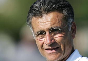 BOURBONNAIS, IL - JULY 28:  General manager Jerry Angelo of the Chicago Bears takes in a practice at the Bears summer training camp on July 28, 2005 at Olivet Nazarene University in Bourbonnais, Illinois.  (Photo by Jonathan Daniel/Getty Images)