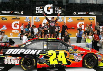 DAYTONA BEACH, FL - FEBRUARY 12: Jeff Gordon, driver of the #24 DuPont Chevrolet, celebrates in victory lane after winning the NASCAR Sprint Cup Series Gatorade Duel 1 at Daytona International Speedway on February 12, 2009 in Daytona Beach, Florida.  (Photo by Geoff Burke/Getty Images for NASCAR)