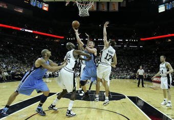 SAN ANTONIO - MAY 30:  Matt Harpring #15 of the Utah Jazz goes up for a shot against Francisco Elson #16 and Brent Barry #17 of the San Antonio Spurs in the fourth quarter of Game Five of the Western Conference Finals during the 2007 NBA Playoffs at AT&T Center on May 30, 2007 in San Antonio, Texas. NOTE TO USER: User expressly acknowledges and agrees that, by downloading and or using this photograph, User is consenting to the terms and conditions of the Getty Images License Agreement.  (Photo by Lisa Blumenfeld/Getty Images)
