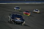FONTANA, CA - FEBRUARY 22: Matt Kenseth, driver of the #17 Carhartt Ford, races Jeff Gordon, driver of the #24 DuPont Chevrolet, and others during the NASCAR Sprint Cup Series Auto Club 500 at Auto Club Speedway on February 22, 2009 in Fontana, California.  (Photo by Jason Smith/Getty Images)