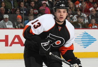 PHILADELPHIA - MARCH 05: Daniel Carcillo #13 of the Philadelphia Flyers skates against the Calgary Flames on March 5, 2009 at the Wachovia Center in Philadelphia, Pennsylvania. (Photo by Bruce Bennett/Getty Images)