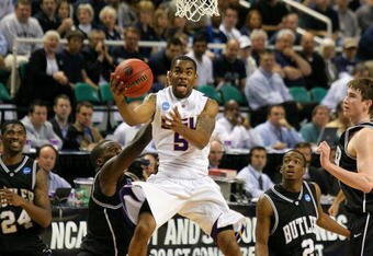 GREENSBORO, NC - MARCH 19:  Marcus Thornton #5 of the Louisiana State University Tigers drives through the defense of the Butler Bulldogs during the first round of the NCAA Division I Men's Basketball Tournament at the Greensboro Coliseum on March 19, 2009 in Greensboro, North Carolina.  (Photo by Streeter Lecka/Getty Images)