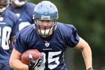 KIRKLAND, WA - JULY 25:  Owen Schmitt #35 of the Seattle Seahawks gets ready for the tackling dummies during training camp at the Seahawks Training Facility on July 25, 2008 in Kirkland, Washington. (Photo by Otto Greule Jr/Getty Images)