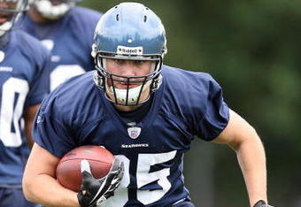 KIRKLAND, WA - JULY 25:  Owen Schmitt #35 of the Seattle Seahawks gets ready for the tackling dummies during training camp at the Seahawks Training Facility on July 25, 2008 in Kirkland, Washington. (Photo by Otto Greule Jr/Getty Images)
