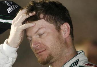 ATLANTA - MARCH 06:  Dale Earnhardt, Jr., driver of the #88 AMP Energy/National Guard Chevrolet, prepares to qualify for the NASCAR Sprint Cup Series Kobalt Tools 500 at the Atlanta Motor Speedway on March 6, 2009 in Hampton, Georgia.  (Photo by Geoff Burke/Getty Images for NASCAR)