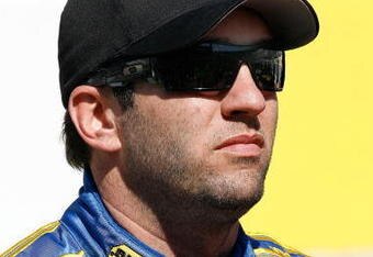 BRISTOL, TN - MARCH 20:  Elliott Sadler driver of the #19 Best Buy Dodge stands on pit road during qualifying for the NASCAR Sprint Cup Series Food City 500 at Bristol Motor Speedway on March 20, 2009 in Bristol, Tennessee.  (Photo by John Harrelson/Getty Images)