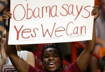 MIAMI - MARCH 20: A fan of the Temple Owls holds up a President Obama sign during the first round of the NCAA Division I Men's Basketball Tournament between the Owls and Arizona State Sun Devils at the American Airlines Arena on March 20, 2009 in Miami, Florida.  (Photo by Marc Serota/Getty Images)