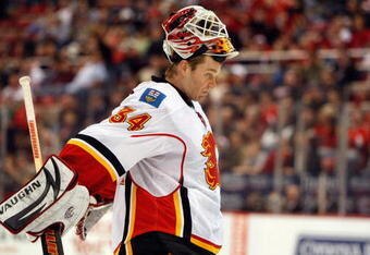DETROIT - MARCH 12:  Miikka Kiprusoff #34 of the Calgary Flames looks on during the game against the Detroit Red Wings on March 12, 2009 at Joe Louis Arena in Detroit, Michigan. (Photo by Gregory Shamus/Getty Images)