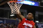MINNEAPOLIS - MARCH 20:  Chris Wright #33 of the Dayton Flyers dunks against the West Virginia Moutaineers during the first round of the NCAA Division I Men's Basketball Tournament at the Hubert H. Humphrey Metrodome on March 20, 2009 in Minneapolis, Minnesota.  (Photo by Jonathan Daniel/Getty Images)