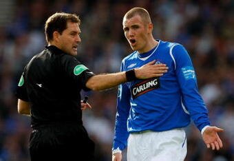 GLASGOW, UNITED KINGDOM - MARCH 15:  Rangers player Kenny Miller argues with referee Douglas Mcdonald during the CIS Insurance Cup Final between Rangers and Celtic at Hampden Park on March 15, 2009 in Glasgow, Scotland.  (Photo by Stu Forster/Getty Images)