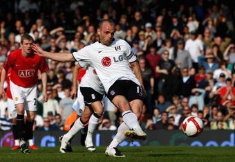 LONDON - MARCH 21:  Danny Murphy of Fulham scores a penalty after Paul Scholes handled the ball on the line and was sent off during the Barclays Premier League match between Fulham and Manchester United at Craven Cottage on March 21, 2009 in London, England.  (Photo by Ryan Pierse/Getty Images)