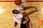 DAYTON, OH - MARCH 20:  Ryan Rossiter #22 of the Siena Saints fights for a rebound with Dallas Lauderdale #52 and Jon Diebler #33 of the Ohio State Buckeyes during the first round of the NCAA Division I Men's Basketball Tournament at the University of Dayton Arena on March 20, 2009 in Dayton, Ohio.  (Photo by Andy Lyons/Getty Images)