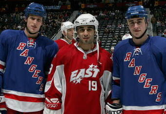 ATLANTA - JANUARY 26:  Eastern Conference Youngstar Marc Staal #18, All-Star Scott Gomez #19 of the New York Rangers, and Youngstar Brandon Dubinsky #17 of the New York Rangers pose together on the ice as part of the 2008 NHL All-Star weekend at Philips Arena on January 26, 2008 in Atlanta, Georgia.  (Photo by Bruce Bennett/Getty Images for the NHL)