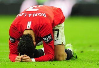 LONDON - MARCH 01:  Cristiano Ronaldo of Manchester United is despondent during the Carling Cup Final match between Manchester United and Tottenham Hotspur at Wembley Stadium on March 1, 2009 in London, England.  (Photo by Mike Hewitt/Getty Images)