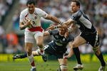 LONDON - MARCH 21:  Chris Paterson of Scotland (R) and Simon Taylor of Scotland tackle Riki Flutey of England during the RBS 6 Nations Championship match between England and Scotland at Twickenham on March 21, 2009 in London, England.  (Photo by Paul Gilham/Getty Images)