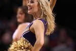 PORTLAND, OR - MARCH 19:  A Washington Huskies cheerleader performs on the court while taking on the Mississippi State Bulldogs during the first round of the NCAA Division I Men's Basketball Tournament at the Rose Garden on March 19, 2009 in Portland, Oregon.  (Photo by Jonathan Ferrey/Getty Images)