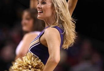 PORTLAND, OR - MARCH 19:  A Washington Huskies cheerleader performs on the court while taking on the Mississippi State Bulldogs during the first round of the NCAA Division I Men's Basketball Tournament at the Rose Garden on March 19, 2009 in Portland, Oregon.  (Photo by Jonathan Ferrey/Getty Images)
