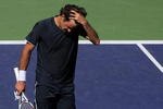 INDIAN WELLS, CA - MARCH 21:  Roger Federer of Switzerland walks to the net after losing his semifinal match to Andy Murray of Great Britain in the BNP Paribas Open on March 21, 2009 at the Indian Wells Tennis Garden in Indian Wells, California.  (Photo by Matthew Stockman/Getty Images)