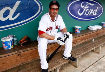 FORT MYERS, FL - MARCH 08:  Infielder Nick Green #22 of the Boston Red Sox watches his team from the dugout against the Tampa Bay Rays during a Grapefruit League Spring Training Game at City of Palms Park on March 8, 2009 in Fort Myers, Florida.  (Photo by J. Meric/Getty Images)