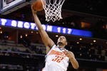 CHARLOTTE, NC - MARCH 16:  Boris Diaw #32 of the Charlotte Bobcats puts a shot up against the Toronto Raptors during their game at Time Warner Cable Arena on March 16, 2009 in Charlotte, North Carolina.  NOTE TO USER: User expressly acknowledges and agrees that, by downloading and/or using this Photograph, user is consenting to the terms and conditions of the Getty Images License Agreement. (Photo by: Streeter Lecka/Getty Images)