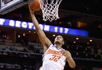 CHARLOTTE, NC - MARCH 16:  Boris Diaw #32 of the Charlotte Bobcats puts a shot up against the Toronto Raptors during their game at Time Warner Cable Arena on March 16, 2009 in Charlotte, North Carolina.  NOTE TO USER: User expressly acknowledges and agrees that, by downloading and/or using this Photograph, user is consenting to the terms and conditions of the Getty Images License Agreement. (Photo by: Streeter Lecka/Getty Images)