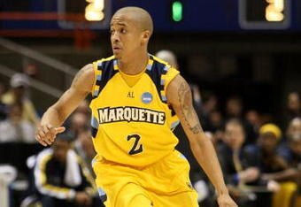 BOISE, ID - MARCH 20:  Guard Maurice Acker #2 of the Marquette Golden Eagles brings the ball upcourt against the Utah State Aggies in the first round of the NCAA Division I Men's Basketball Tournament at the Taco Bell Arena on March 20, 2009 in Boise, Idaho.  (Photo by Jed Jacobsohn/Getty Images)