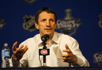 MONTREAL, CANADA- MAY 3:  Guy Carbonneau of the Montreal Canadiens explains his views on the series after being defeated by the Philadelphia Flyers in Game Five of the Eastern Conference Semifinals of the 2008 NHL Stanley Cup Playoffs on May 3, 2008 at the Bell Centre in Montreal, Canada.  The Philadelphia Flyers defeated the Montreal Canadiens 6-4 winning the series four games to one. (Photo by Phillip MacCallum/Getty Images)