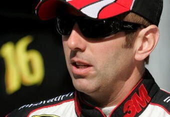 BRISTOL, TN - MARCH 21:  Greg Biffle, driver of the #16 3M Ford, stands in the garage area during practice for the NASCAR Sprint Cup Series Food City 500 at Bristol Motor Speedway on March 21, 2009 in Bristol, Tennessee.  (Photo by Jerry Markland/Getty Images for NASCAR)